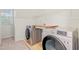 Convenient laundry room with modern, front-load washer and dryer at 8 Bryncastle Ct, Durham, NC 27707