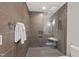 The bathroom features a glass shower with a built-in seat and recessed shelving at 8 Bryncastle Ct, Durham, NC 27707