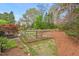 Outdoor space features a fenced garden and lush landscaping at 8 Bryncastle Ct, Durham, NC 27707