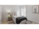 Cozy bedroom with neutral tones, window, and stylish decor at 8412 Lunar Stone Pl, Raleigh, NC 27613