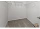 Walk-in closet featuring carpet and wire shelving at 8412 Lunar Stone Pl, Raleigh, NC 27613