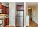Bright kitchen with stainless steel appliances and granite countertops at 9845 Sweet Basil Dr, Wake Forest, NC 27587