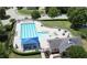 Aerial view of the community pool with lounge chairs and a shaded picnic area at 9845 Sweet Basil Dr, Wake Forest, NC 27587