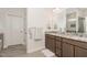 Modern bathroom with double vanity, granite countertops, and tile flooring at 1001 Jarrett Bay Rd, Willow Springs, NC 27592