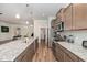 Well-equipped kitchen with stainless steel appliances, granite countertops, and ample cabinet space at 1001 Jarrett Bay Rd, Willow Springs, NC 27592