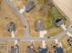 Aerial view of the property showcasing the home's layout, surrounding neighborhood and landscaping at 1001 Peterson Ridge Rd, Fuquay Varina, NC 27526