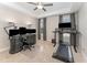 Multi-functional bedroom with desk, treadmill, and a ceiling fan at 1001 Peterson Ridge Rd, Fuquay Varina, NC 27526