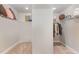 Well-organized walk-in closet with shelving and hanging space for clothes and accessories at 1001 Peterson Ridge Rd, Fuquay Varina, NC 27526