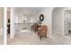 Hallway area with stylish seating, iron railing, and elegant décor at 1001 Peterson Ridge Rd, Fuquay Varina, NC 27526
