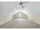 Spacious carpeted attic offers ample natural light, versatile for a variety of uses in a finished space at 1007 Surry Dale Ct, Apex, NC 27502