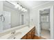 Bathroom featuring a double vanity with wooden cabinets at 1007 Surry Dale Ct, Apex, NC 27502