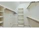 Spacious walk-in closet with shelving and rod, for optimal storage at 1007 Surry Dale Ct, Apex, NC 27502