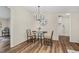 Charming dining area with a modern chandelier and glass table at 110 Hickory Dr, Spring Hope, NC 27882