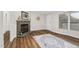 A stone fireplace as a centerpiece in a cozy living room at 110 Hickory Dr, Spring Hope, NC 27882