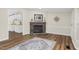 A stone fireplace as a centerpiece in a cozy living room at 110 Hickory Dr, Spring Hope, NC 27882