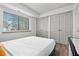 Bedroom featuring closet, window, and LVP floors at 1110 Schaub Dr # B, Raleigh, NC 27606