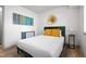 Stylish bedroom with luxury vinyl plank flooring and modern decor at 1110 Schaub Dr # B, Raleigh, NC 27606