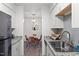 Bright kitchen and dining room with modern finishes and stainless steel appliances at 1110 Schaub Dr # B, Raleigh, NC 27606