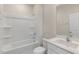 Bright bathroom features tub-shower combo and single sink vanity at 116 Pisgah St, Sanford, NC 27330