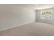 Bedroom with carpet and window at 116 Pisgah St, Sanford, NC 27330