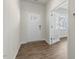 Bright entryway features wood-look flooring, a white front door with windows, and an open view into the living space at 116 Pisgah St, Sanford, NC 27330