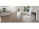 Bright living room with hardwood floors and sliding door at 116 Pisgah St, Sanford, NC 27330