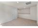 Upstairs loft area with neutral carpeting, perfect for an office or play area at 116 Pisgah St, Sanford, NC 27330