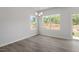 Dining area with hardwood floors, modern lighting, and large windows at 120 Central Townes Way # 292, Raleigh, NC 27603