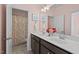 Elegant bathroom featuring a double sink vanity with stylish fixtures and decor at 126 Filigree Way, Durham, NC 27713