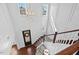 Stunning two-story foyer with wainscoting and views of the staircase and entryway at 126 Filigree Way, Durham, NC 27713