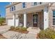 Charming brick home with a welcoming front porch and manicured landscaping at 126 Filigree Way, Durham, NC 27713