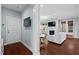 Cozy living room with a fireplace, comfortable seating, and natural light at 126 Filigree Way, Durham, NC 27713