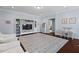 Bright playroom with a large rug, custom bookcase, and kid-friendly decor at 126 Filigree Way, Durham, NC 27713