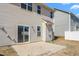 The house boasts a large sliding door to the concrete patio with a low maintenance yard at 130 Campaign Dr, Mebane, NC 27302