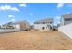 A spacious backyard that offers plenty of room and privacy for activities and gatherings at 130 Campaign Dr, Mebane, NC 27302