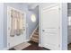Bright entryway with hardwood floors and staircase at 130 Campaign Dr, Mebane, NC 27302