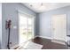 Bright sunroom with sliding doors, natural light, and a view of the outdoor space creating a cozy retreat at 130 Campaign Dr, Mebane, NC 27302