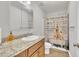 Bathroom with vanity, sink, and horse themed shower curtain at 130 Hardy Rd, Wendell, NC 27591