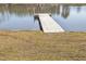 The home features a private dock with access to a serene lake at 130 Hardy Rd, Wendell, NC 27591