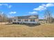 Attractive one-story home with a spacious yard, showcasing the exterior and serene surroundings at 130 Hardy Rd, Wendell, NC 27591