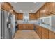 Well-equipped kitchen featuring stainless steel appliances, ample cabinet space, and granite countertops at 130 Hardy Rd, Wendell, NC 27591
