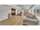 Open living room concept featuring hardwood floors, comfortable seating, and ample natural light at 130 Hardy Rd, Wendell, NC 27591