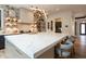 Spacious kitchen with a large island, white countertops, and modern lighting at 1323 Ridge Rd, Raleigh, NC 27607