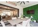 Outdoor patio with a dining area that leads to a living room at 1323 Ridge Rd, Raleigh, NC 27607