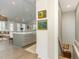 Open concept kitchen with a large center island and stylish pendant lighting at 1327 Gloriosa St, Apex, NC 27523