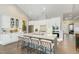 Modern kitchen with stainless steel appliances, a center island, and ample counter space at 1327 Gloriosa St, Apex, NC 27523