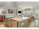 Open-concept living space with modern decor and a view of the fireplace at 1327 Gloriosa St, Apex, NC 27523