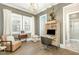 Bright home office with natural light, built in desk, and unique decor at 1327 Gloriosa St, Apex, NC 27523