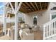 Outdoor patio with comfortable seating under a covered area at 1327 Gloriosa St, Apex, NC 27523