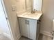 Bathroom vanity featuring gray cabinetry, modern hardware, white countertop, and stylish faucet at 1448C Maplewood Dr, Durham, NC 27704